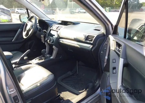 2014 Subaru Forester 2.5I Touring z USA, uszkodzony, nr VIN JF2SJAMC2EH548849